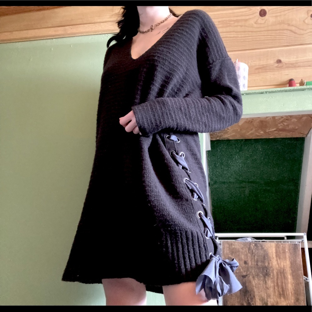 Black Free People sweater dress with a lace up detail!